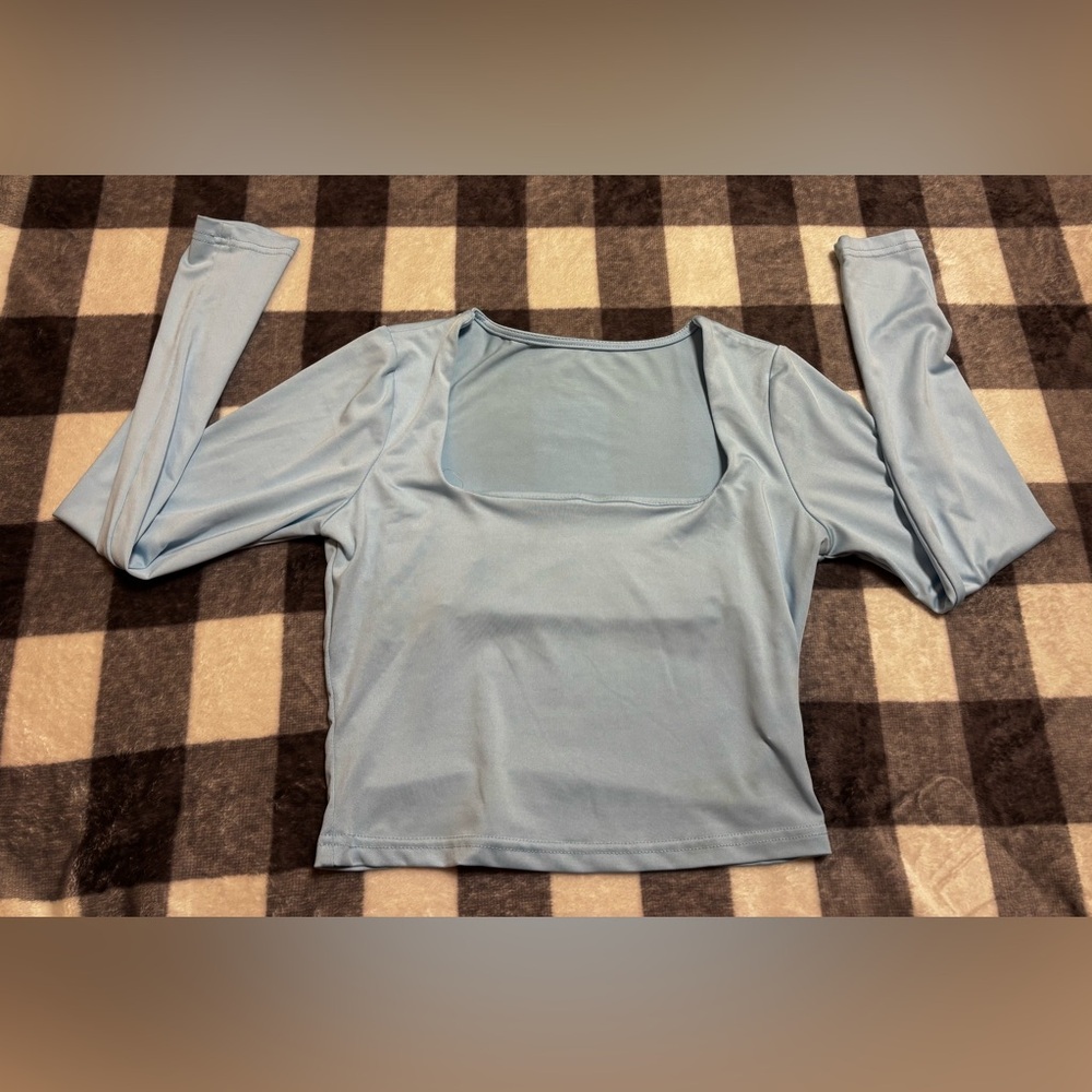 Blue long sleeve crop top with thin built in support